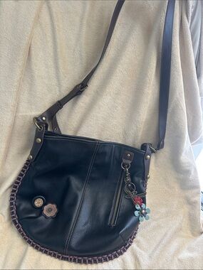 Chala Brown Leather Crossbody Bag with Floral Charm